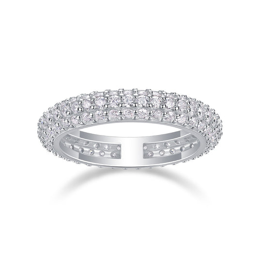 Silver ring with embedded diamonds on a white background